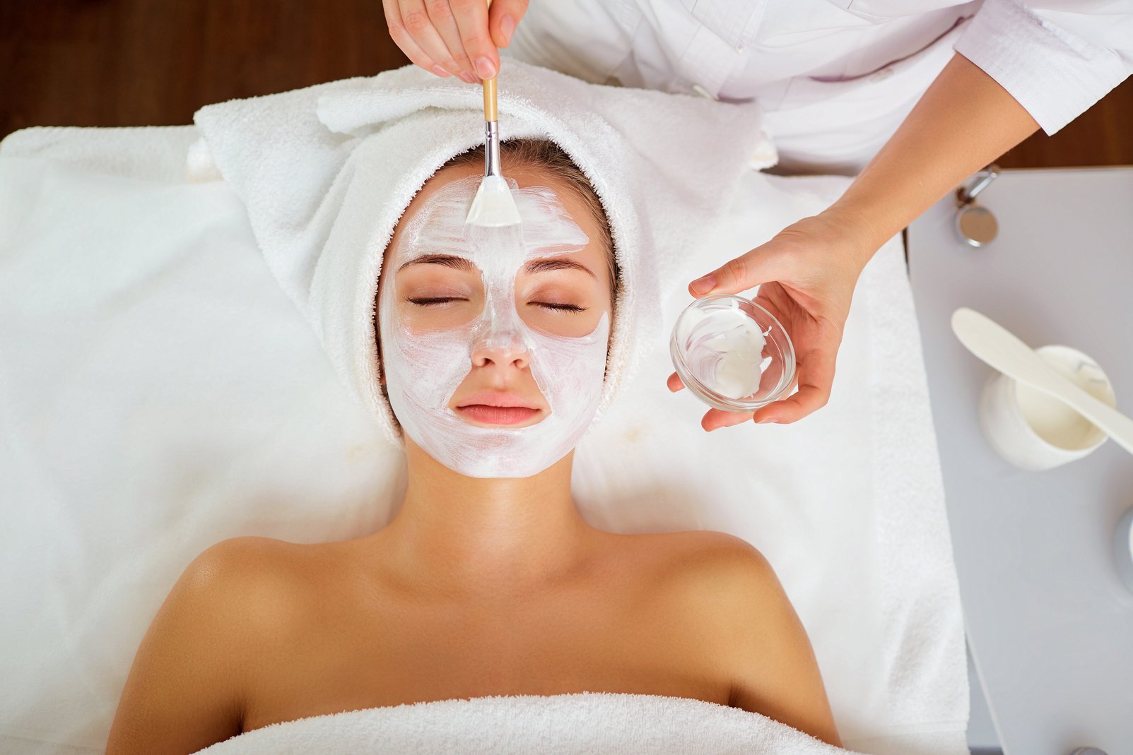 Applying Facial Mask at Spa